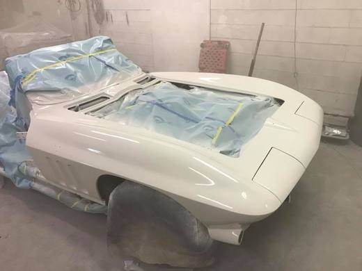 A Corvette Sting Ray masked up for paint